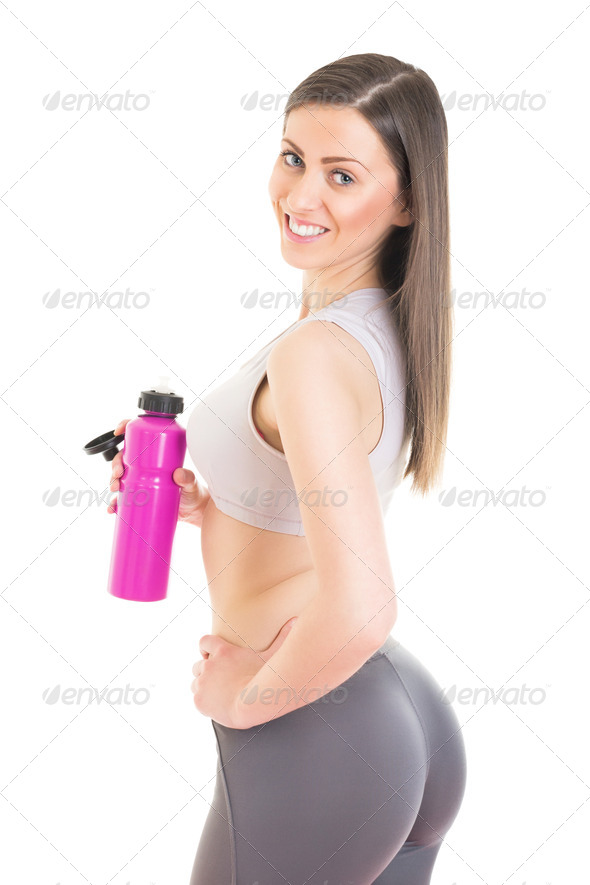 Attractive fitness girl refreshing after training - Stock Photo - Images