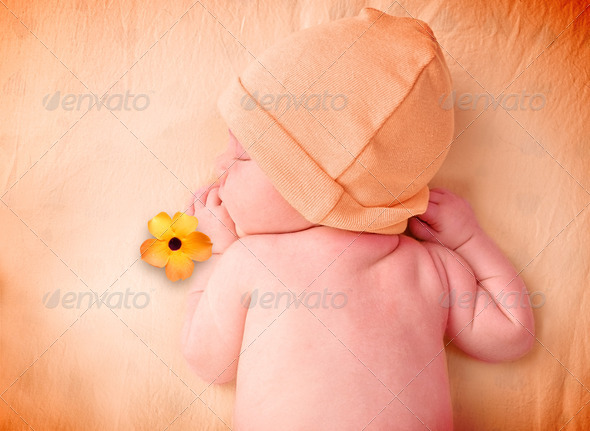 Little Newborn Baby Sleeping with Flower