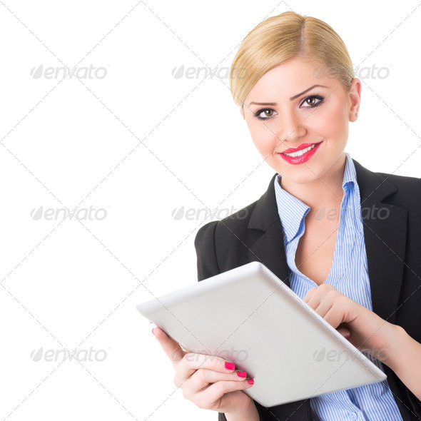 Beautiful blonde businesswoman using digital tablet - Stock Photo - Images