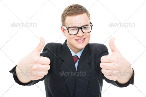 Successful businessman showing thumbs up - Stock Photo - Images