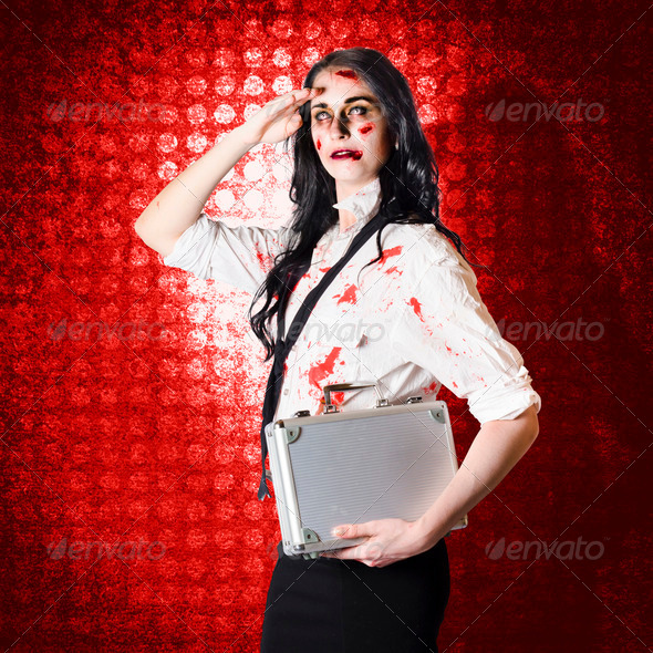Zombie business woman in red alert emergency