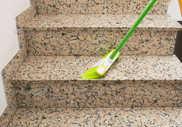 brush cleaning the stairs