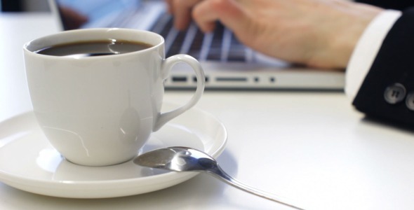 Drinking Coffee at the Office Drinking Coffee at the Office