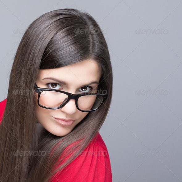 Beautiful businesswoman wearing black nerd glasses - Stock Photo - Images