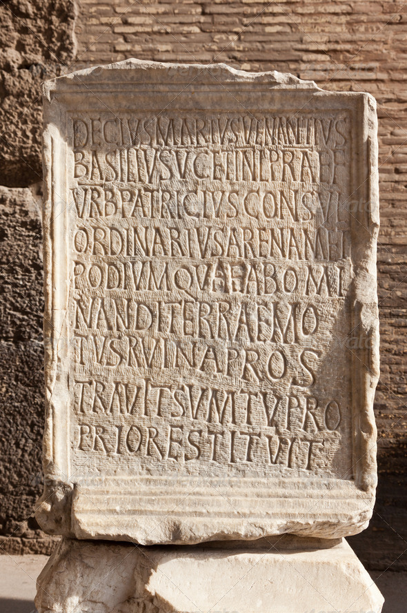 Ancient roman epigraph. Inscription located in Colosseum Arena, Roma, Italy.