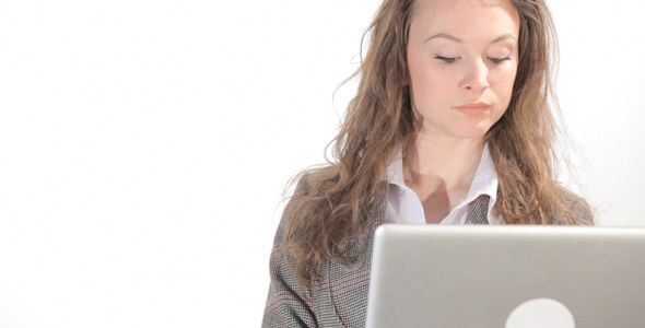 Secretary Typing on a Laptop on White Background Secretary Typing on a Laptop on White Background