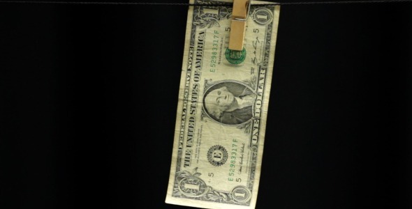 Dollar Hanging From a Rope on Black Dollar Hanging From a Rope on Black