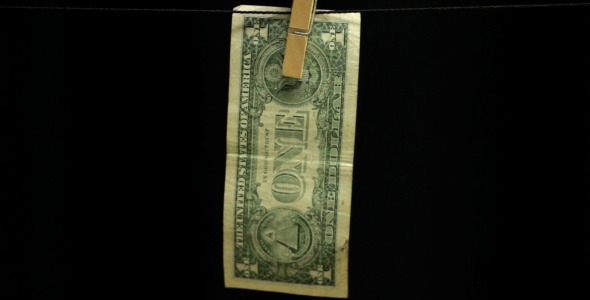 One Dollar Hanging from a Rope on Black One Dollar Hanging from a Rope on Black