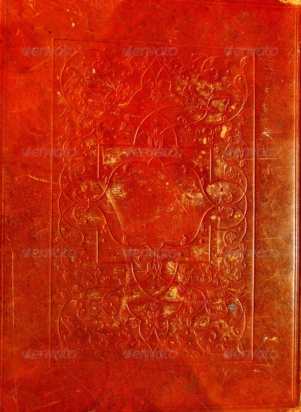 Old red leather texture with decorative frame.