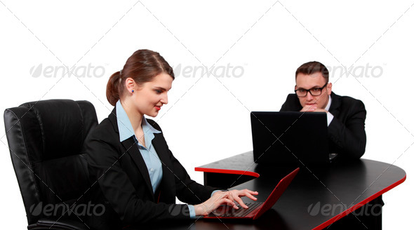 Young Couple on Latops - Stock Photo - Images
