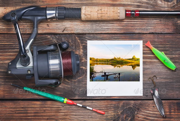 fishing tackle and a photo of successful fishing