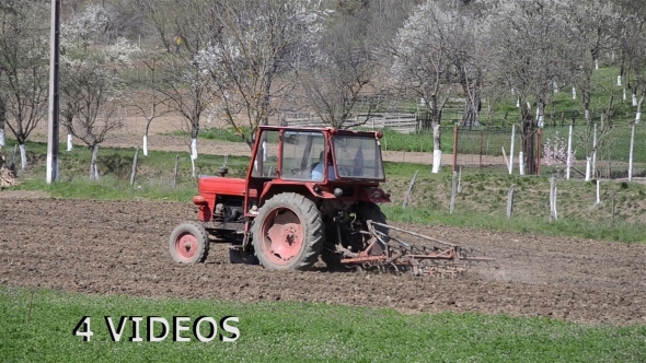 Tractor Plowing A Field 01 Tractor Plowing A Field 01
