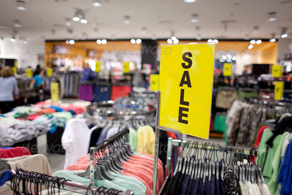 Yellow Sale Sign at Clothing Retail Store
