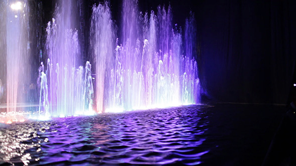 Colorful Fountain And Water Surface Colorful Fountain And Water Surface