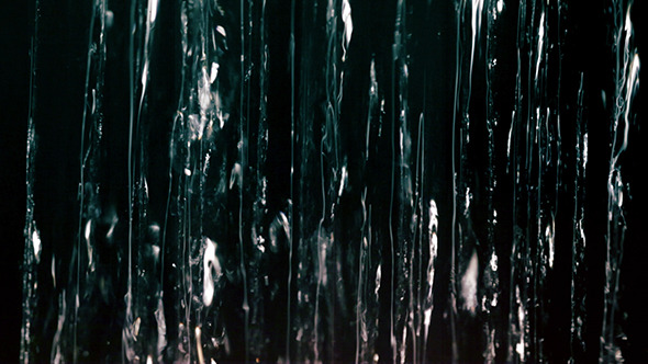 Water Jets On Black Background Water Jets On Black Background