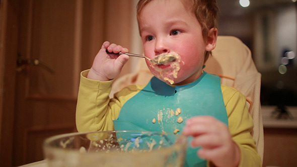 Two Year Old Boy Is Having Dinner Two Year Old Boy Is Having Dinner