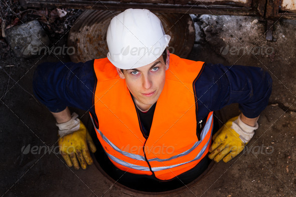Worker in Manhole