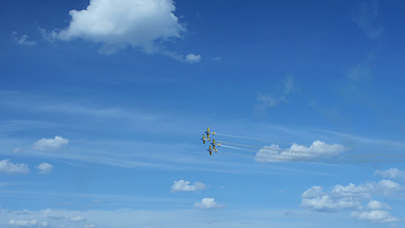 Airplanes Doing Tricks on Blue Sky Background 2 Airplanes Doing Tricks on Blue Sky Background 2