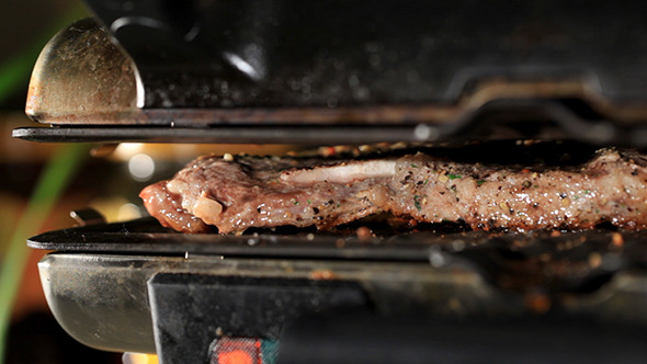 VideoHive Pieces Of Meat Are Fried On The Barbecue 4845904 VideoHive Pieces Of Meat Are Fried On The Barbecue 4845904