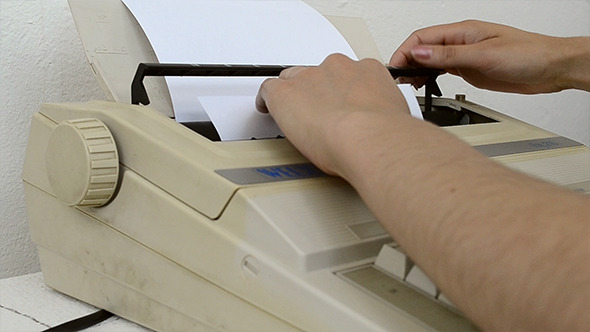 Inserting A Blank Sheet to Typewriter Inserting A Blank Sheet to Typewriter