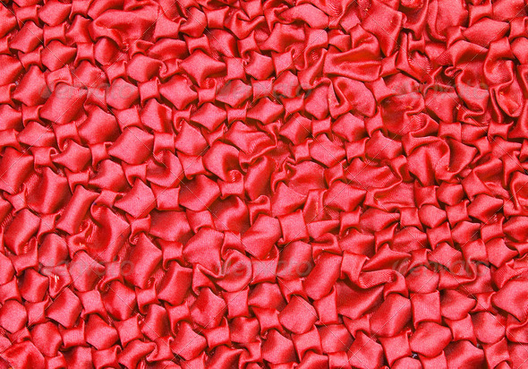 Crumpled red silk fabric texture