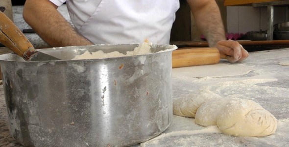 Baker Making Pitas With Roller 2 Baker Making Pitas With Roller 2