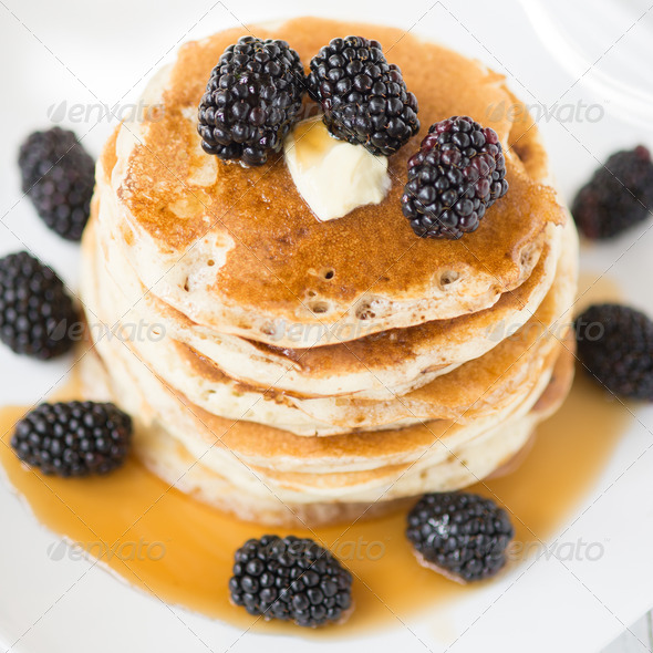 Pancakes with blackberry and maple syrup