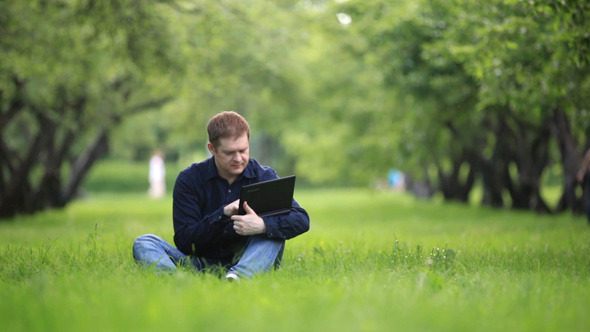 Businessman Working In The Park Businessman Working In The Park