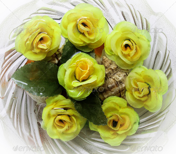 Decorative artificial flowers in water