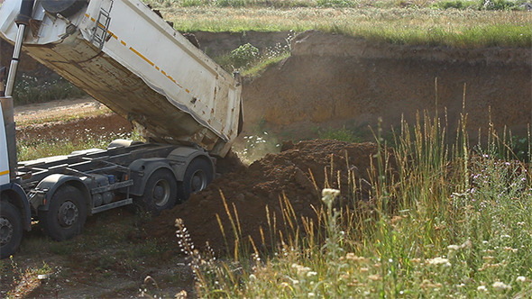 Dump Truck Unloads Dump Truck Unloads