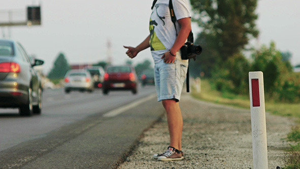Male Hitchhiker on Busy Road 3 Male Hitchhiker on Busy Road 3