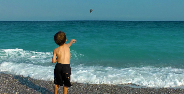 Boy Throwing Stones To The Sea 2 Boy Throwing Stones To The Sea 2