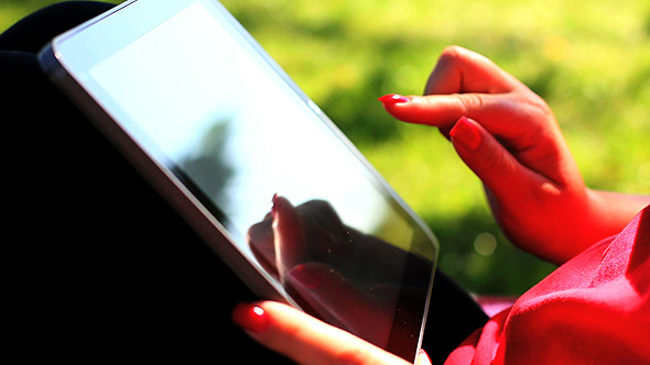 Tablet In The Park Closeup Tablet In The Park Closeup
