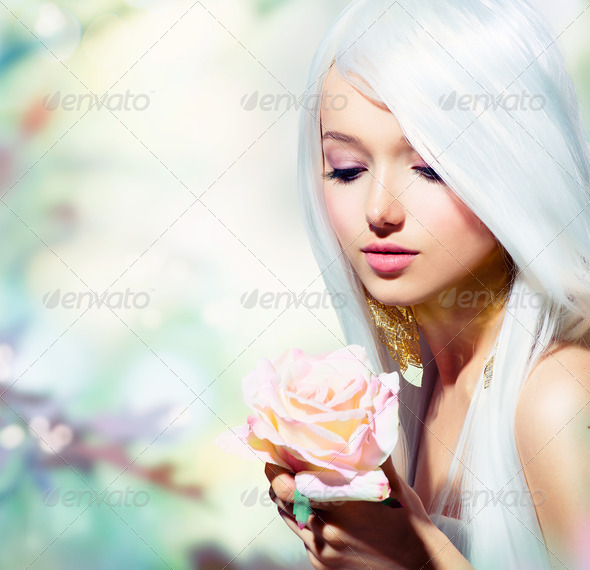 Beautiful Spring Girl With Rose Flower. Fantasy