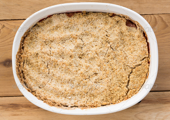 Traditional british apple crumble pie in dish