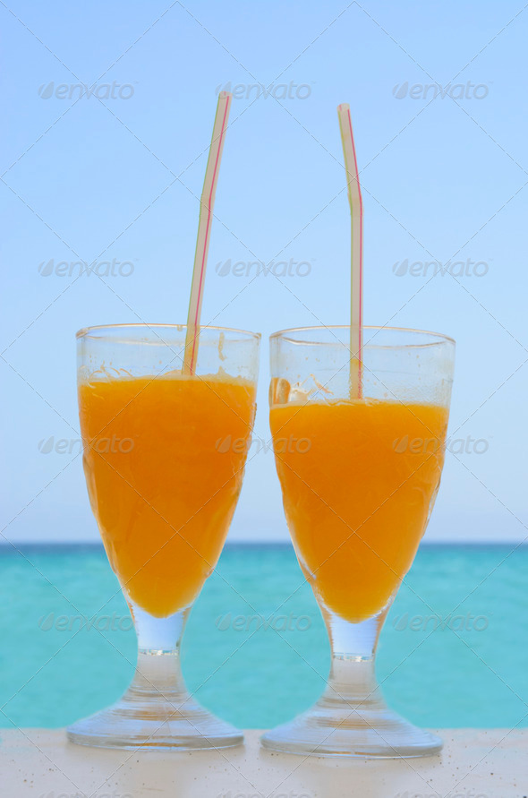 Two glasses with orange juice