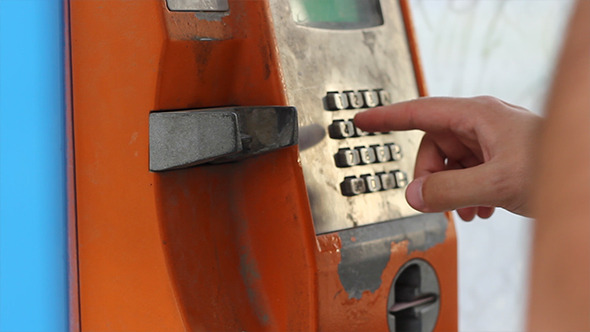 Dialing on Phone Booth Dialing on Phone Booth