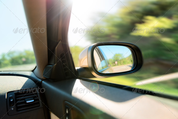 rear-view mirror of car
