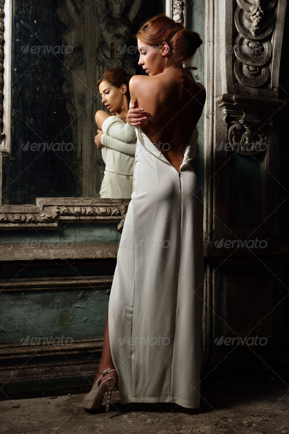 beautiful woman in white dress with naked back. - Stock Photo - Images