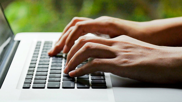 Typing On A Notebook Typing On A Notebook