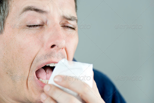 Man Sneezing