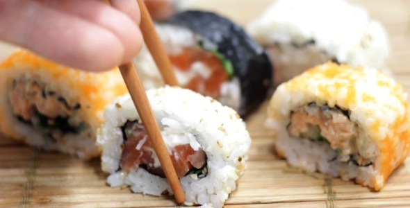 Eating Sushi Maki Rolls Eating Sushi Maki Rolls
