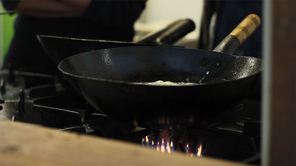 Cook Boiling in Black Pan Cook Boiling in Black Pan