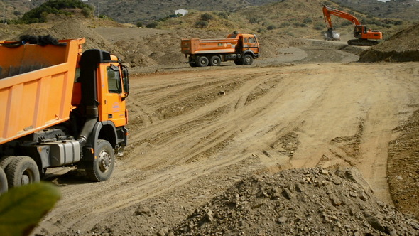 Trucks and Excavator Working Trucks and Excavator Working