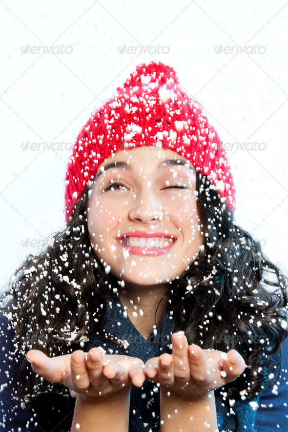 Snowfall over the girl