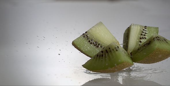 VideoHive Halve Kiwi is Falling and Dividing on Wet Surface 9845078 VideoHive Halve Kiwi is Falling and Dividing on Wet Surface 9845078