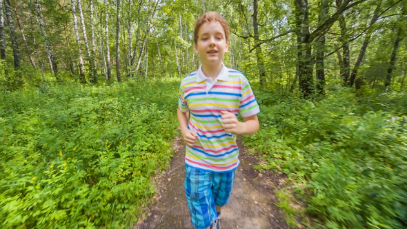 Teenager Boy Jogging in Park Teenager Boy Jogging in Park