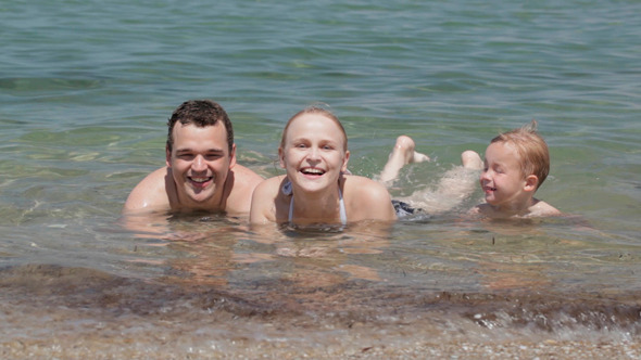 Young Family in the Sea Young Family in the Sea
