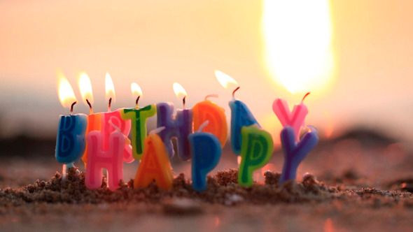 Birthday Candles Burning on a Seashore Birthday Candles Burning on a Seashore