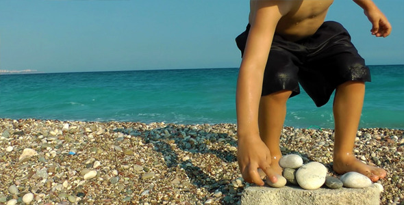 Kid Throwing Stones To The Sea Kid Throwing Stones To The Sea